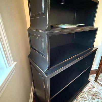 Black wood pagoda style bookshelf