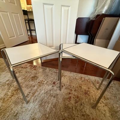 Three great white and chrome side tables