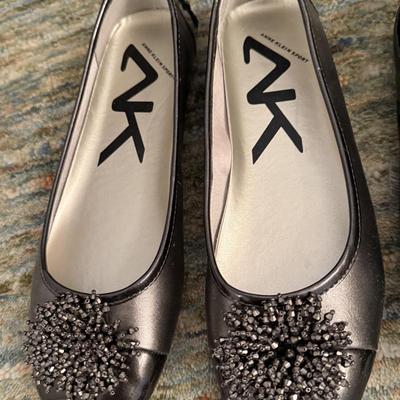 Three pairs of like new flats, size 10