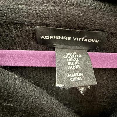 Two XL pieces of clothing, sweater and top