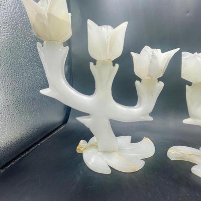 Sale Photo Thumbnail #201: Each candelabra holds 3 candles, candle holders look like tulip flowers.  Good condition, very heavy. Approx. 7" at the tallest point.