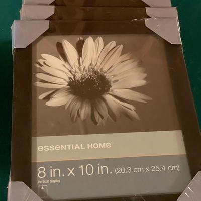 5 picture frames in the plastic