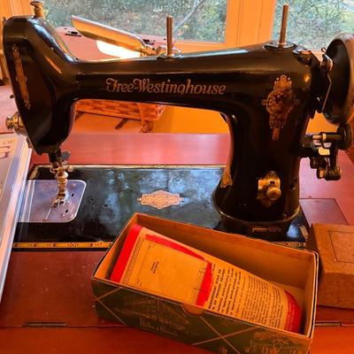 566 Antique Westinghouse Sewing Machine & Stand with Books and Chair