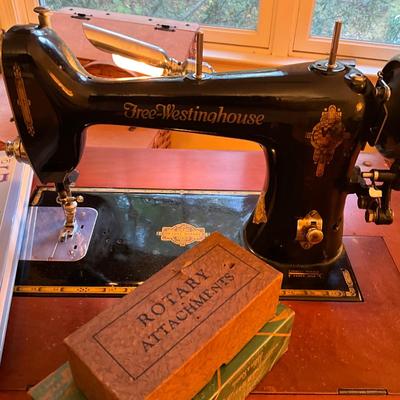 566 Antique Westinghouse Sewing Machine & Stand with Books and Chair