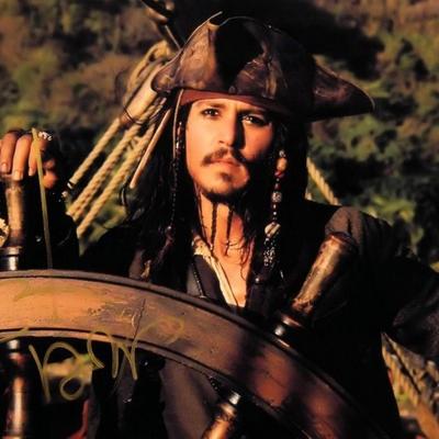 Johnny Depp signed Pirates of the Caribbean movie photo 