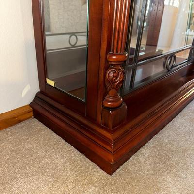 ORNATE LIGHTED CURIO CABINET WITH MIRRORED BACK