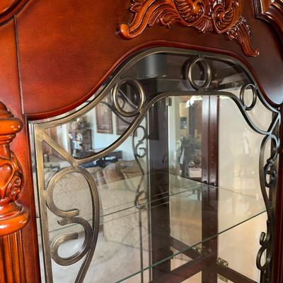 ORNATE LIGHTED CURIO CABINET WITH MIRRORED BACK