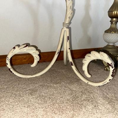 HANGING CLOCK ON AN IRON FRAME AND 2 FLOOR PILLAR CANDLE HOLDERS