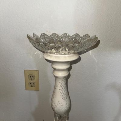 HANGING CLOCK ON AN IRON FRAME AND 2 FLOOR PILLAR CANDLE HOLDERS