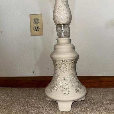 HANGING CLOCK ON AN IRON FRAME AND 2 FLOOR PILLAR CANDLE HOLDERS