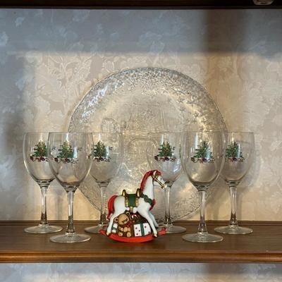 HOLIDAY GLASS PLATTER, STEMMED GLASSES AND A ROCKING HORSE