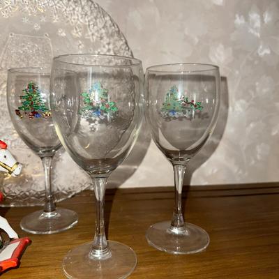 HOLIDAY GLASS PLATTER, STEMMED GLASSES AND A ROCKING HORSE