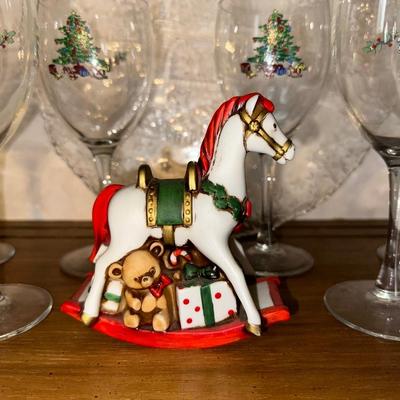HOLIDAY GLASS PLATTER, STEMMED GLASSES AND A ROCKING HORSE