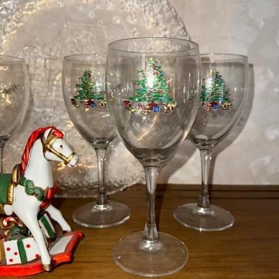 HOLIDAY GLASS PLATTER, STEMMED GLASSES AND A ROCKING HORSE
