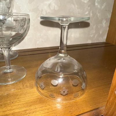 A COLLECTION OF ETCHED GLASSWARE