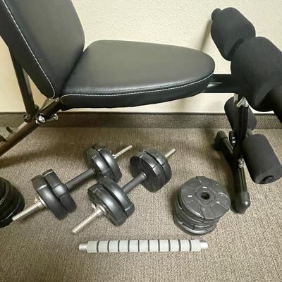 Sale Photo Thumbnail #319: Steel frame, multi-position backrest for sitting or laying flat workouts. 300 pound capacity.  Includes 2 adjustable dumbbells (each with 4 2.5kg widths), plus 4 extra 2kg weights and 4 extra 2.5kg weights, and a padded bar with threaded ends for creating