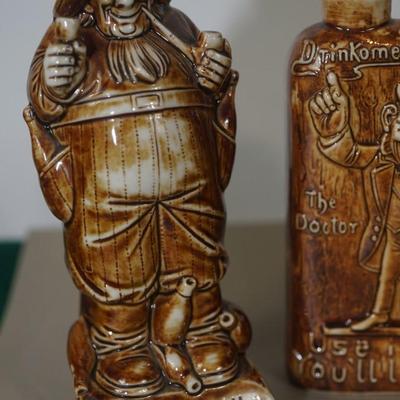 GROUPING OF THREE GERMAN ANTIQUE CERAMIC LIQUOR FLASKS - CHARACTER FORMS
