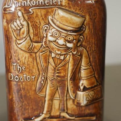 GROUPING OF THREE GERMAN ANTIQUE CERAMIC LIQUOR FLASKS - CHARACTER FORMS