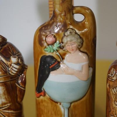 GROUPING OF THREE GERMAN ANTIQUE CERAMIC LIQUOR FLASKS - CHARACTER FORMS