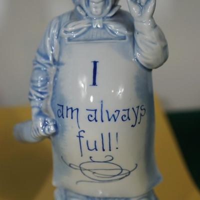 GROUPING OF THREE BLUE AND WHITE GERMAN CHARACTER PORCELAIN LIQUOR FLASKS