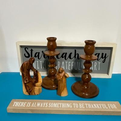 Wooden candle sticks and hand carved religious figurines w/wall decor