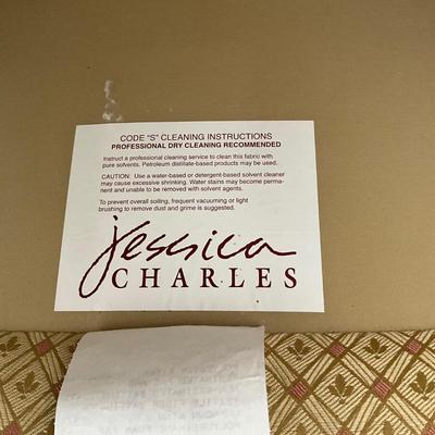 010 Pair of Jessica Charles Upholstered Swivel Club Chairs
