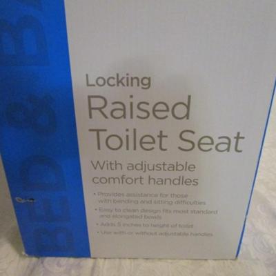 Equate Locking Raised Toilet Seat with adjustable comfort handles