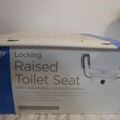 Equate Locking Raised Toilet Seat with adjustable comfort handles