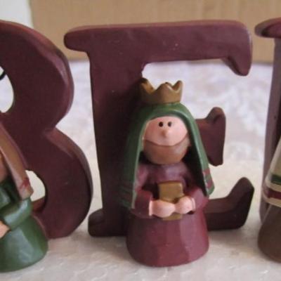Miniature nativity set, also spells "Believe"