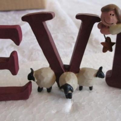 Miniature nativity set, also spells "Believe"