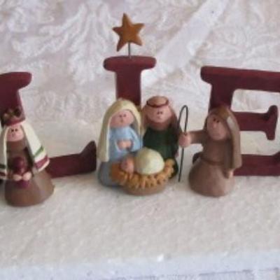 Miniature nativity set, also spells "Believe"