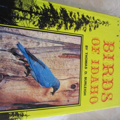 3 books - one on birds, one history, one on seasons