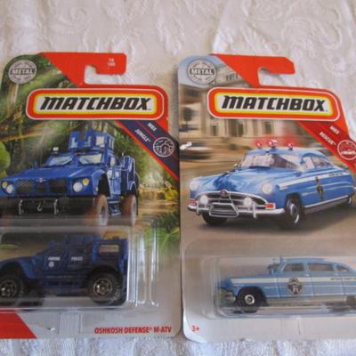 2 Matchbox cars, new in package