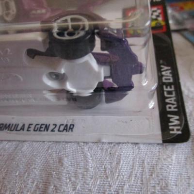 2 Hot Wheels cars, new in package