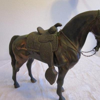 Heavy horse statue (bronze?) with removable saddle