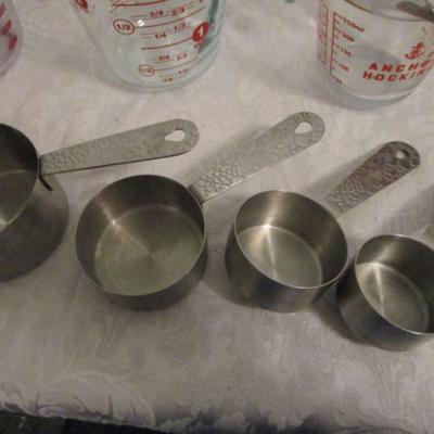Measuring cups, 2 are glass one is plastic, set of stainless steel
