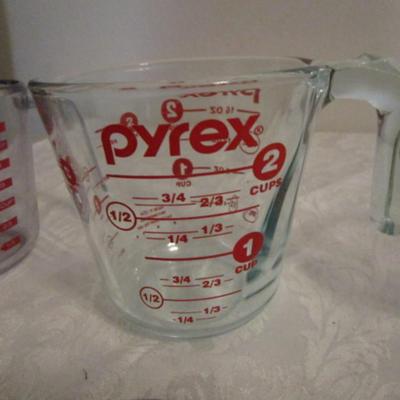 Measuring cups, 2 are glass one is plastic, set of stainless steel