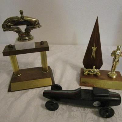 2 pinewood derby trophies & pinewood derby car