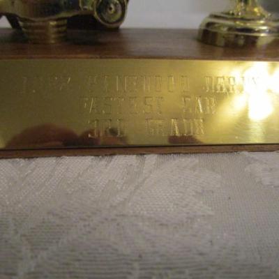 2 pinewood derby trophies & pinewood derby car