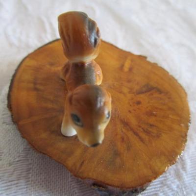 Dinnell's ceramic figurines on wood slab (2)