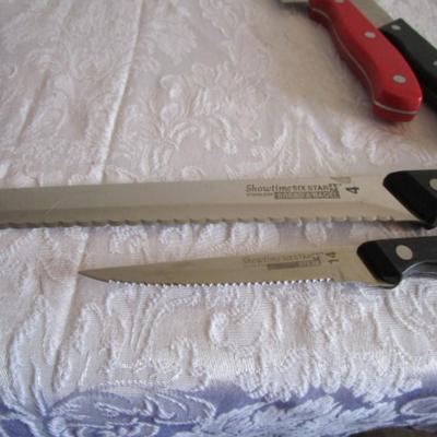 4 kitchen  knives, one chop 'n serve