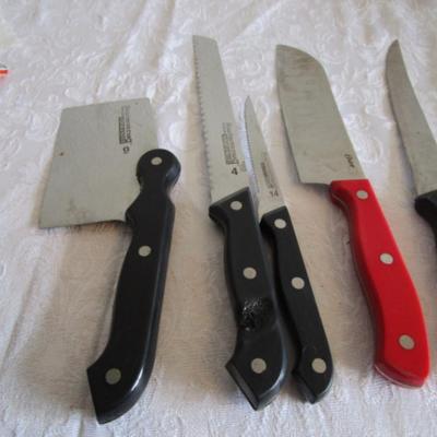 4 kitchen  knives, one chop 'n serve