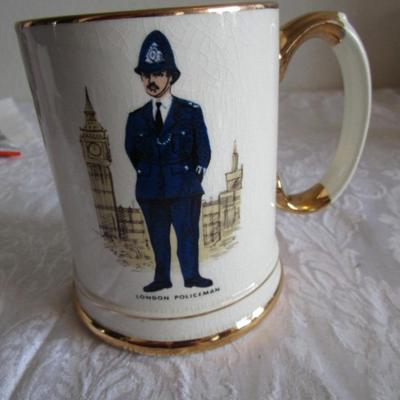 Gold trimmed London Policeman cup made by Price Kensington Model 3265
