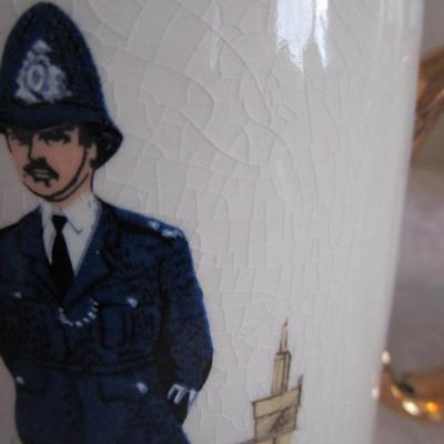 Gold trimmed London Policeman cup made by Price Kensington Model 3265
