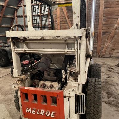 610 Melroe Bobcat in working order
