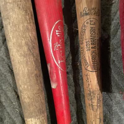 Baseball bats, fishing items, snowboard and lawn chairs