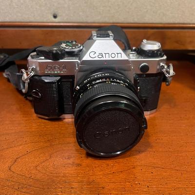 Canon AE1 35MM Camera with Extra Lenses & Accessories (BC-MG)