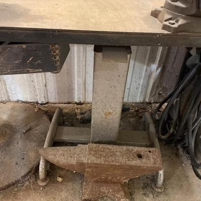 Anvil and metal table with vise