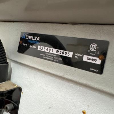 Delta drill press with metal accessories