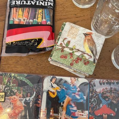 10 beverage glasses, coasters & drink parasols